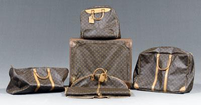 Five pieces Louis Vuitton luggage all with soft sides leather