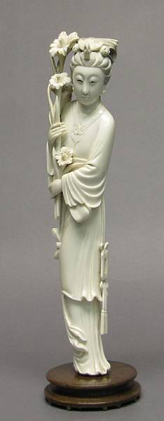 An ivory figural carving of a beauty 20th Century The
