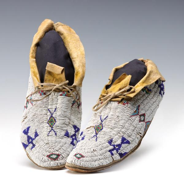 GOOD SIOUX OR CHEYENNE BEADED MOCCASINS CIRCA 1900The heavily beaded