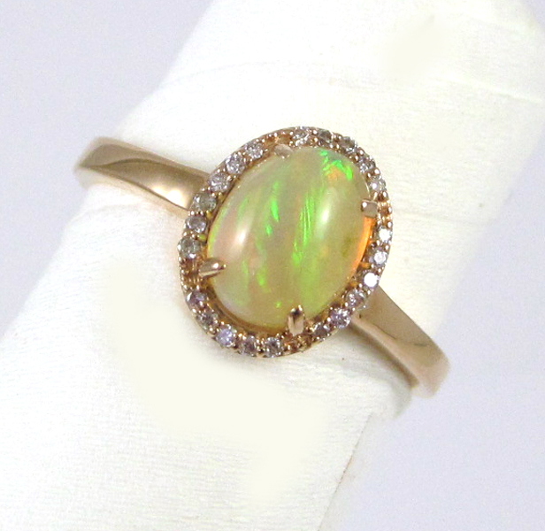 OPAL DIAMOND AND FOURTEEN KARAT GOLD RING The rose gold
