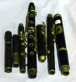 Components for a flute with presentation mouth piece reading Presented