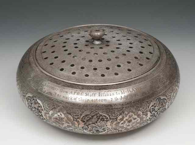 A PERSIAN SILVER PIERCED BOWL and cover intricately carved with