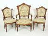 PARLOR SUITE Three piece Victorian walnut framed upholstered parlor suite