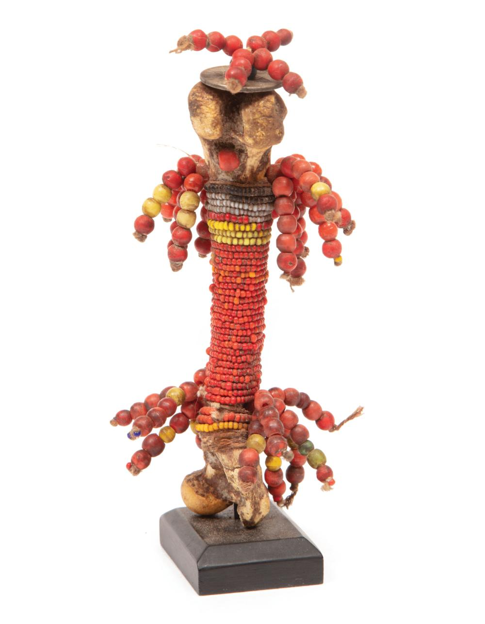 African Bead and Coin Embellished Ritual Bone Doll possibly Fali