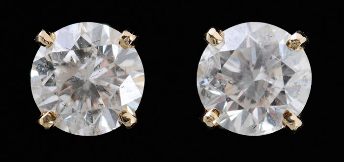 Diamond Stud Earrings each set with round brilliant cut diamond