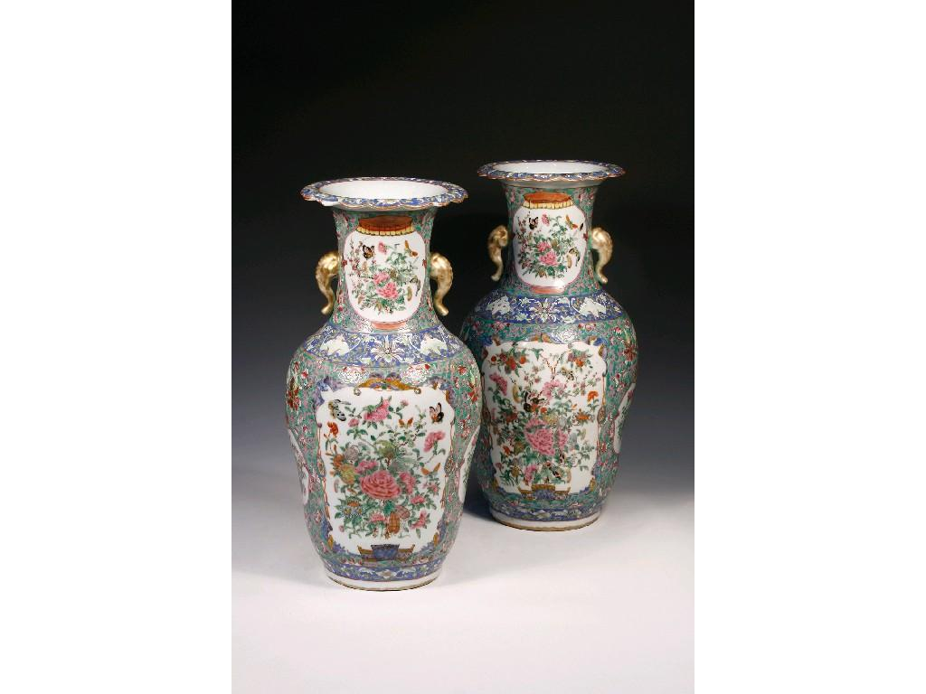 A PAIR OF CANTONESE FAMILLE ROSE VERTE VASES enamelled in