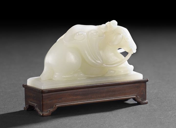 Chinese Carved White Jade Figure of a Recumbent Goat 18th