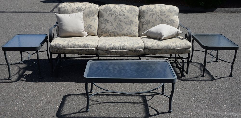 Four Piece Outdoor Lot to include sofa glider with cushions