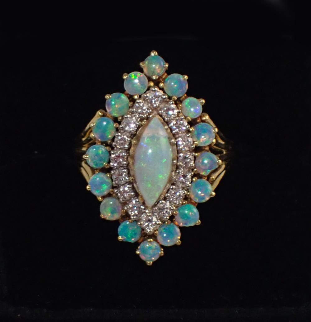 OPAL DIAMOND AND EIGHTEEN KARAT GOLD RING with 16 round