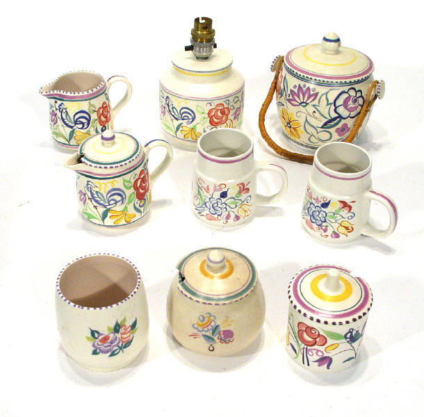 Collection of floral hand painted traditional Poole pottery including a