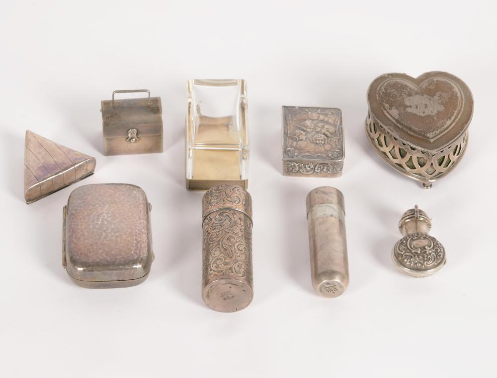 GROUP OF SILVER BOXESthe first domed with handle marked Cartier