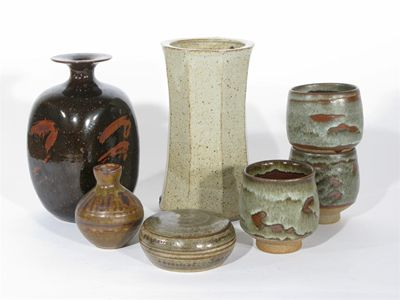 A Lowerdown Pottery stoneware vase ovoid with a resist decorated