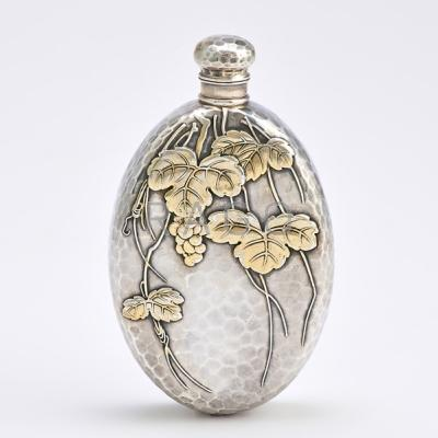 TIFFANY CO JAPANESQUE PARCEL GILT SILVER FLASK Oval spot hammered