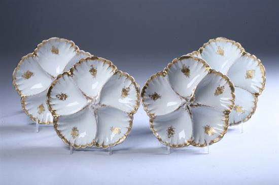 TWELVE LIMOGES PORCELAIN OYSTER PLATES late 19th century Each with