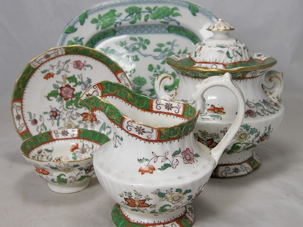 A Victorian Staffordshire china tea service with green and gilt
