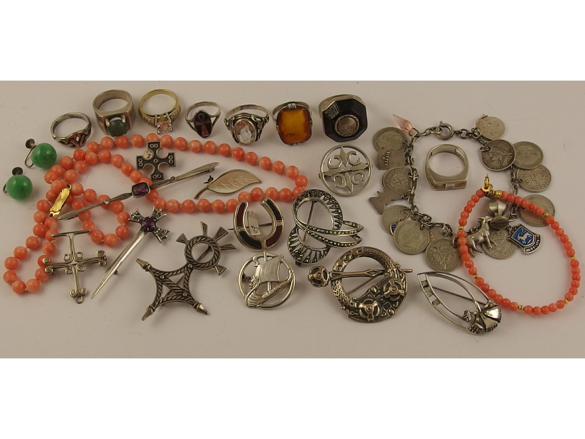 A collection of silver and white metal items to include