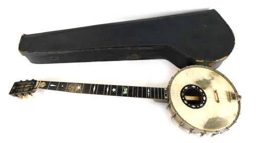 An FC Wilkes banjo with ebonised handle and mother of