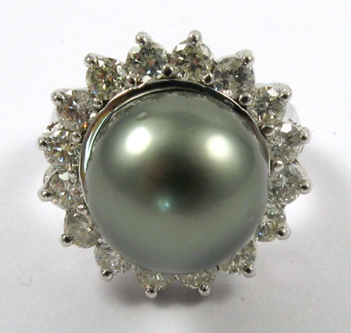 BLACK PEARL AND FOURTEEN KARAT GOLD RING The 12 05