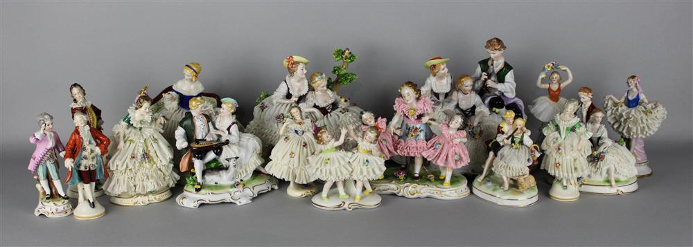 SIXTEEN VARIOUS CRINOLINE FIGURES including musical groups pastoral groups and