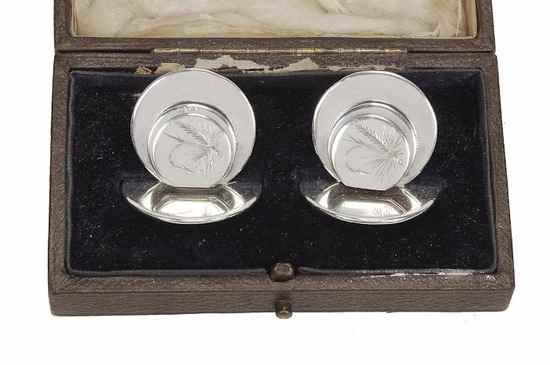 A pair of silver menu holders by The Goldsmiths Silversmiths