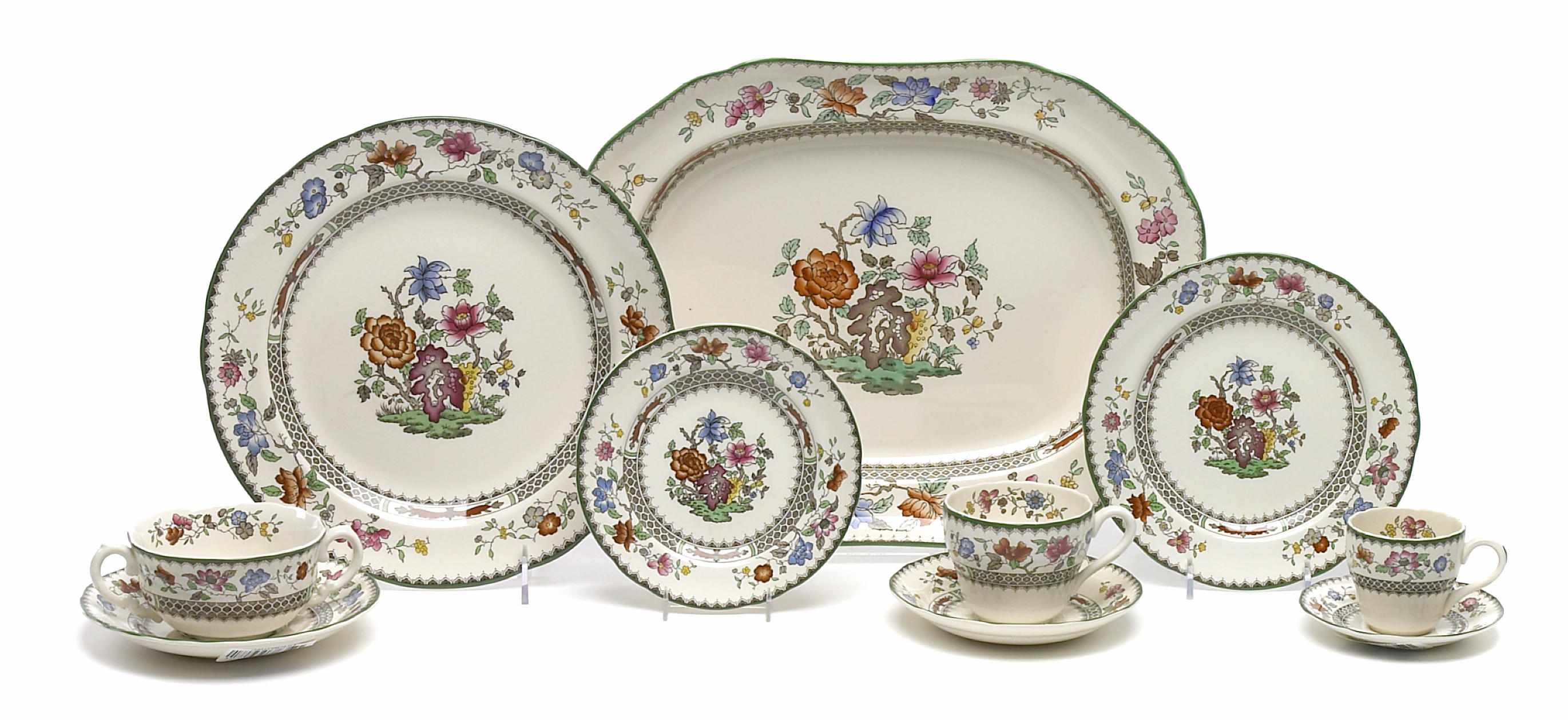 A Spode part dinner service in the Chinese Rose pattern