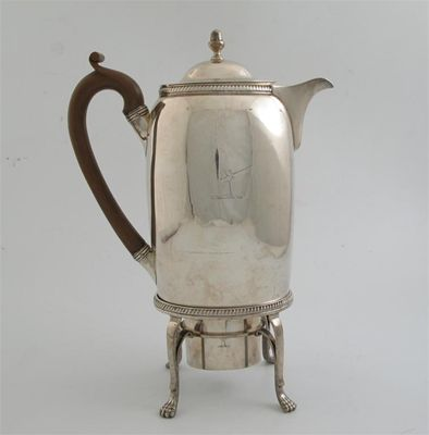 A George III coffee biggin on four legged stand with
