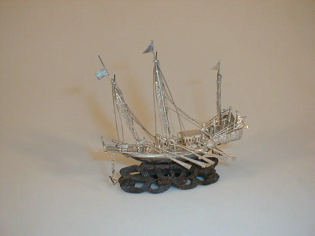 A Chinese white metal model of a Junk modelled with