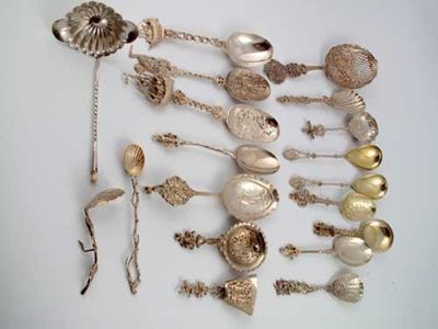 A quantity of decorative continental spoons including a large Dutch