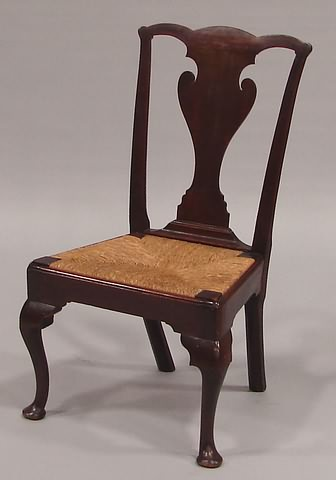 Shaped crest rail vase form splat rush seat side rails