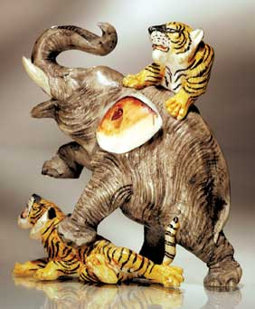 POLYCHROME IVORY OKIMONO Realistically carved and polychromed netsuke size ivory
