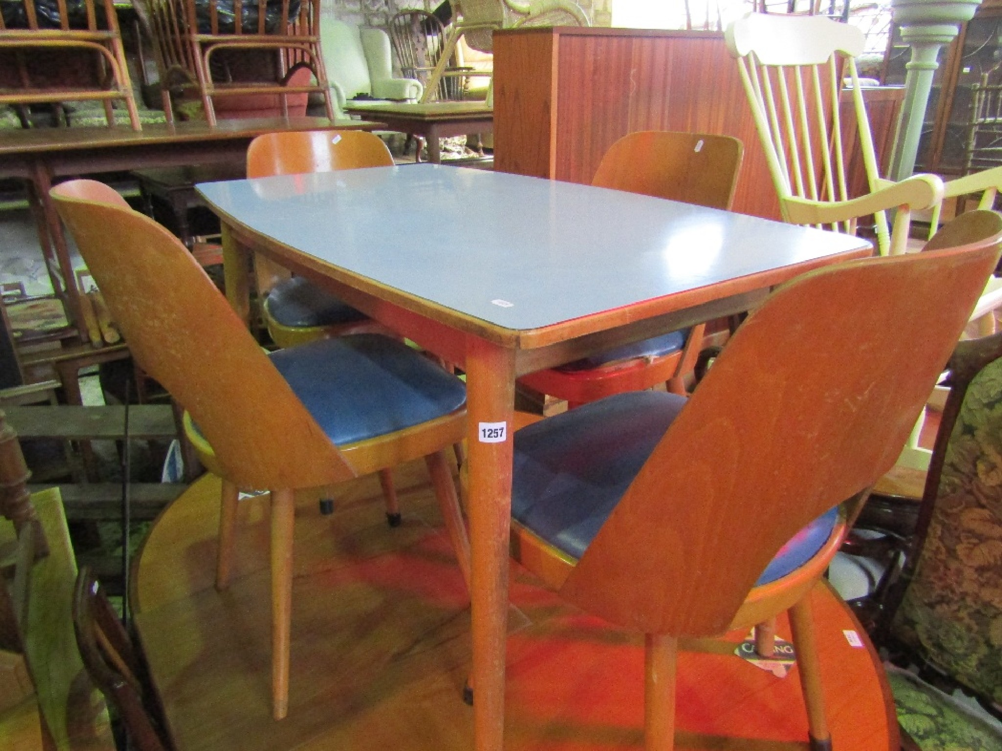 A mid 20th century beechwood kitchen table of rectangular form