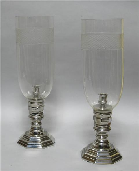 PAIR OF CHROME HURRICANE LAMPS Each with a single candleholder