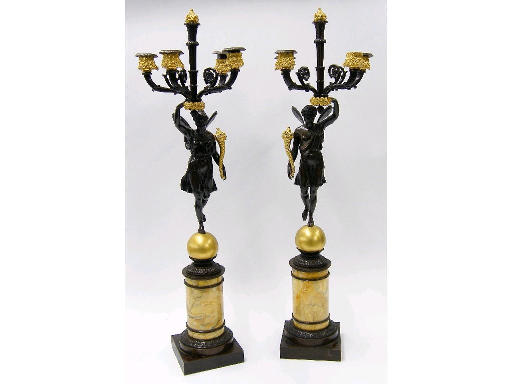 Fine pair of French bronze and ormolu candelabra modelled as