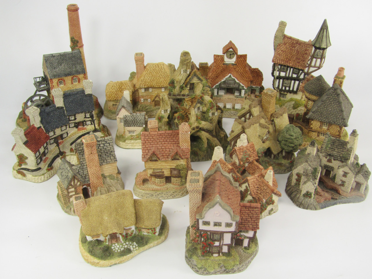 David Winter Cottage sculptures comprising The Woocutter s Cottage Wine