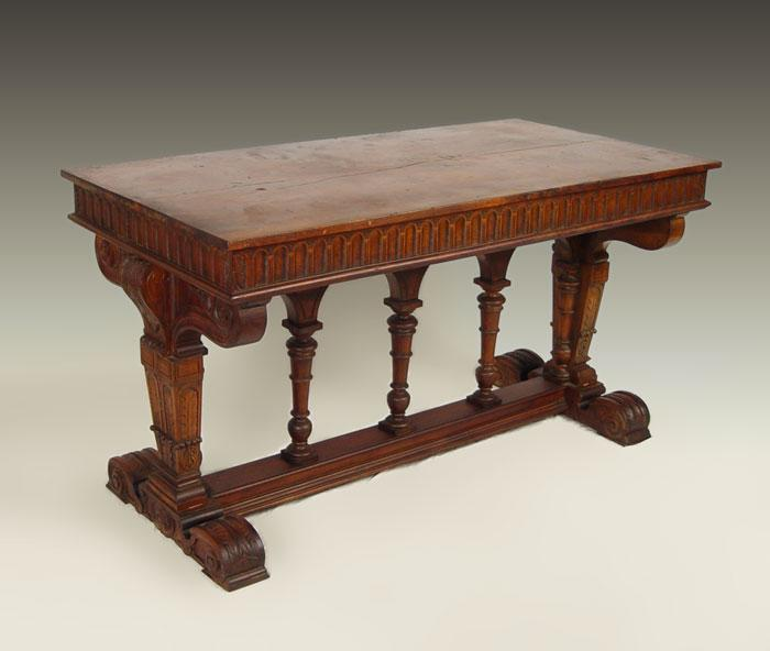 CARVED GOTHIC STYLE TRESTLE BASE LIBRARY TABLE Maple and walnut