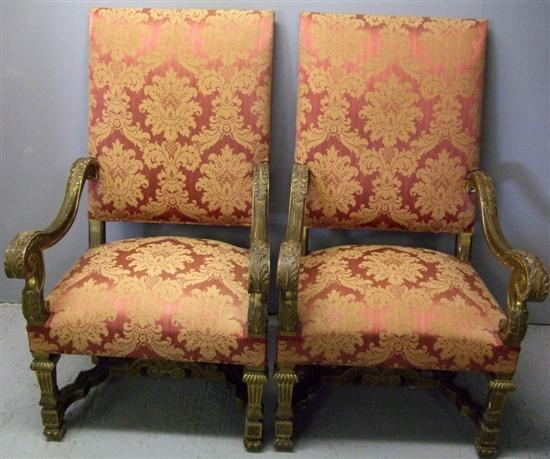 Pair of Baroque style gilt arm chairs with upholstered backs