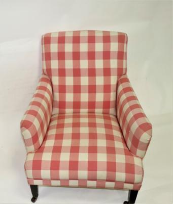 A Howard type armchair on square tapering front legs with