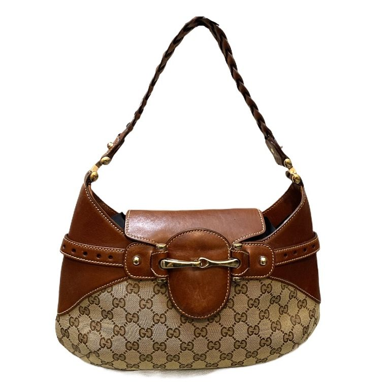 Gucci Monogram Hobo Bag This Gucci Monogram canvas hobo bag