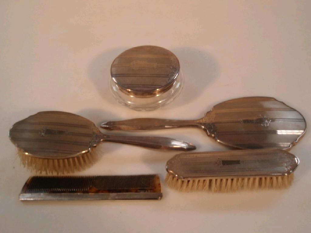 A 20thC silver backed dressing table set Birmingham 1963 comprising