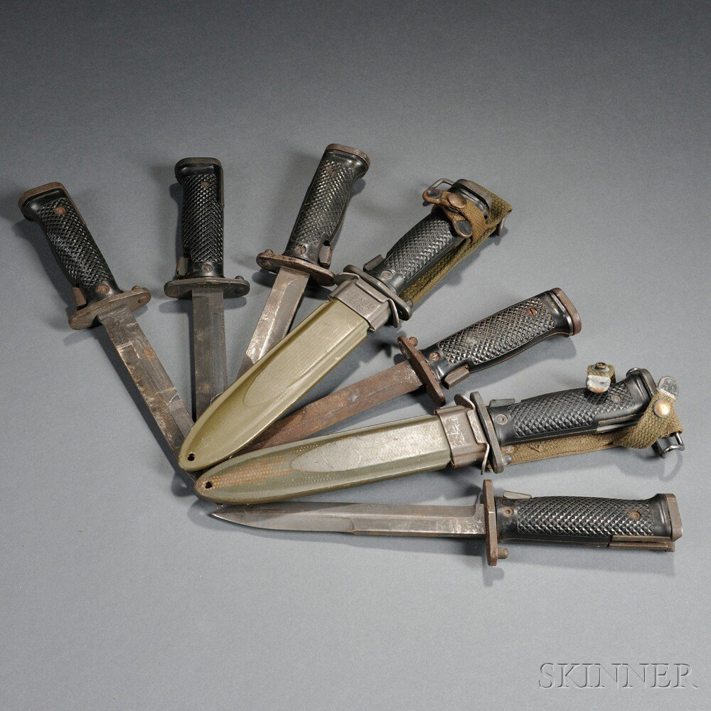 Seven M5 and M5A1 Bayonets c 1950s five with plastic