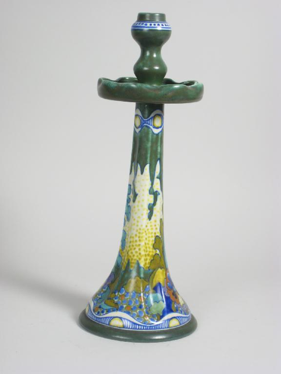 A Gouda Art Nouveau Candlestick with stylised floral design on
