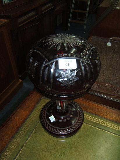 A ruby flash cut glass table lamp with mushroom shaped