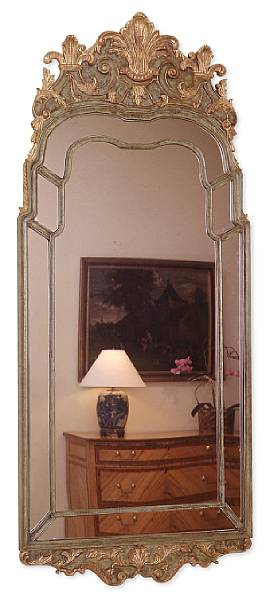 An English Regency style painted and giltwood mirror Boldly carved