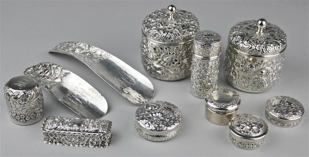 GROUP OF AMERICAN REPOUSSE SILVER DRESSER JARS AND A PAIR