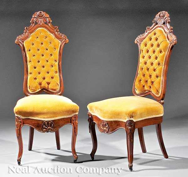 A Pair of American Rococo Carved Rosewood and Cane Slipper