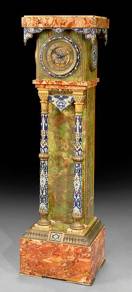 A French gilt bronze mounted onyx champlev clock last quarter
