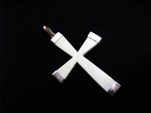 Ivory cross pendant with 18K yellow gold tips and clasp