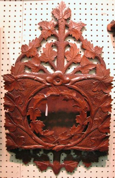 Victorian walnut periodicals wall rack with carved reticulated leaf design