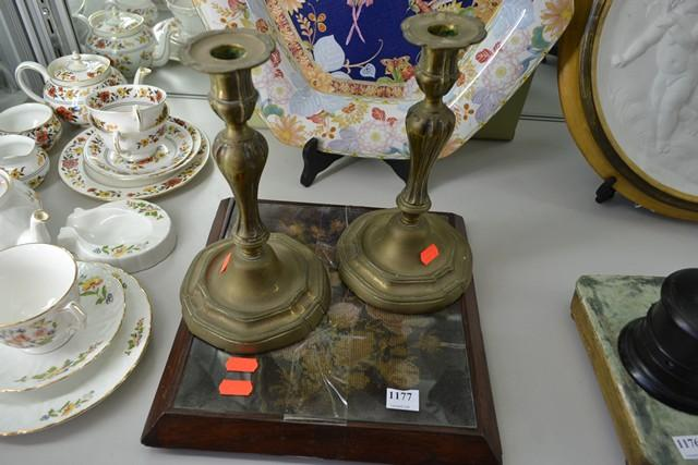 PAIR OF BRASS CANDLE HOLDERS AND A TAPESTRY INSET TRIVET