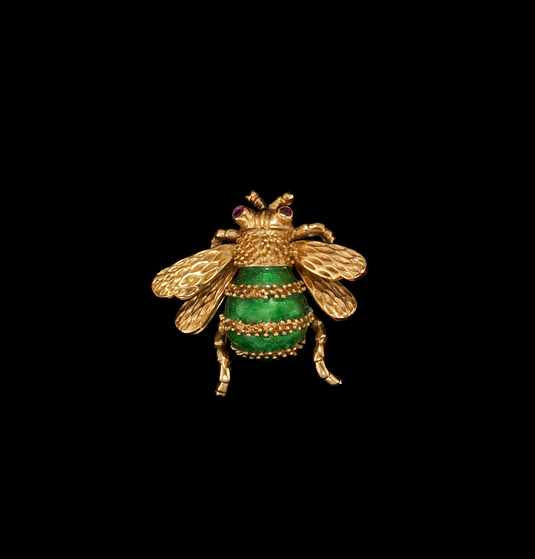 18KT YELLOW GOLD RUBY AND ENAMEL BROOCH In the form